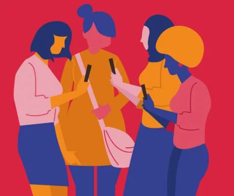 groep meisjes kijkt op hun telefoon